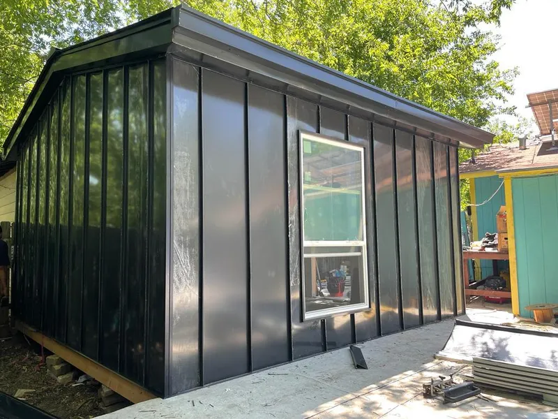 Black standing seam metal wall panels for Roof Inspection in Live Oak